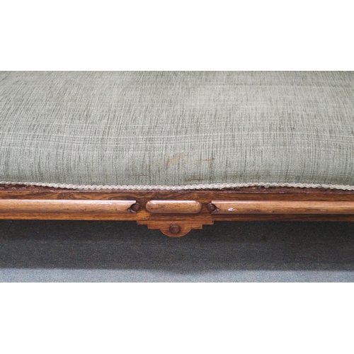 873 - A VICTORIAN ROSEWOOD SCROLL BACK SETTEE