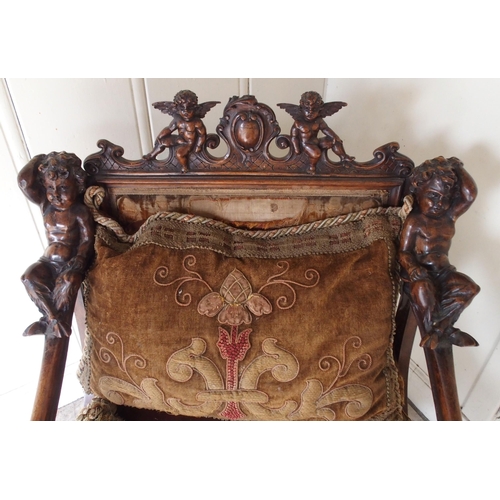 875 - AN UNUSUAL CONTINENTAL PROBABLY ITALIAN WALNUT BARONIAL CHAIR