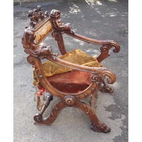 875 - AN UNUSUAL CONTINENTAL PROBABLY ITALIAN WALNUT BARONIAL CHAIR