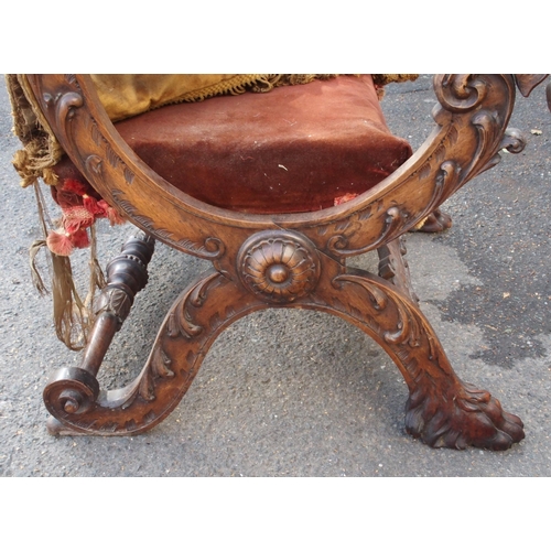 875 - AN UNUSUAL CONTINENTAL PROBABLY ITALIAN WALNUT BARONIAL CHAIR