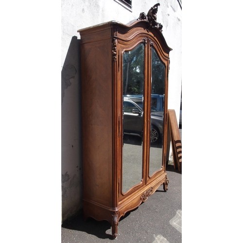 876 - A FRENCH WALNUT ARMOIRE