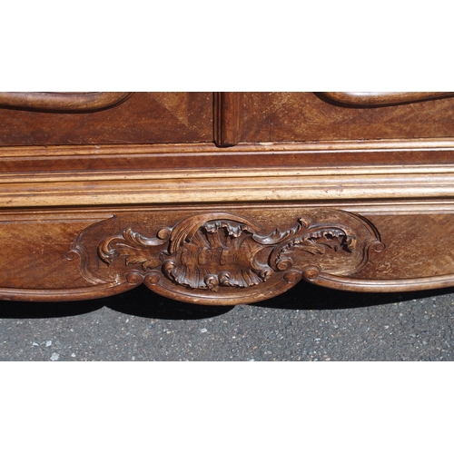 876 - A FRENCH WALNUT ARMOIRE