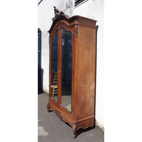 876 - A FRENCH WALNUT ARMOIRE