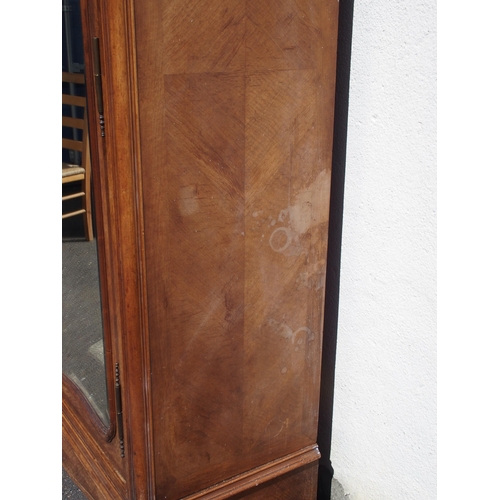 876 - A FRENCH WALNUT ARMOIRE