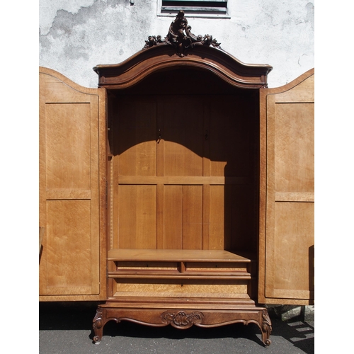 876 - A FRENCH WALNUT ARMOIRE