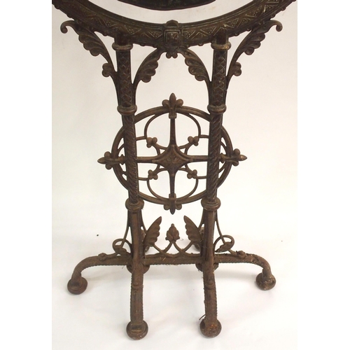 879 - A VICTORIAN CAST IRON GONG AND STAND