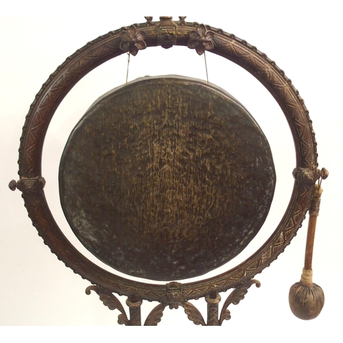 879 - A VICTORIAN CAST IRON GONG AND STAND