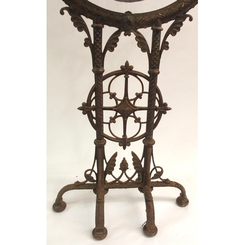 879 - A VICTORIAN CAST IRON GONG AND STAND