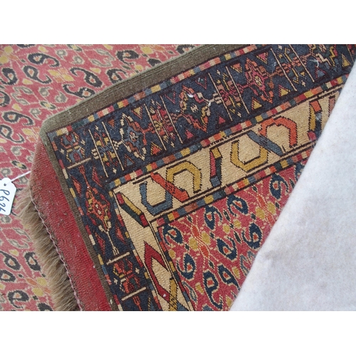 881 - AN EASTERN PINK GROUND RUG