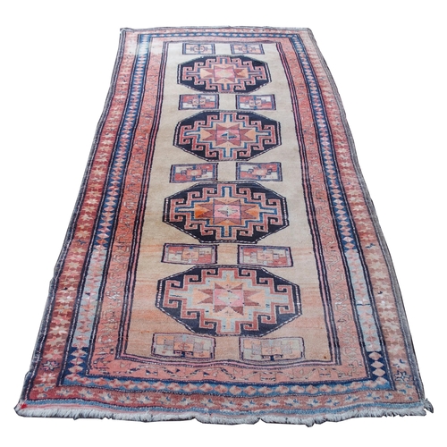 883 - AN ARAAK RED GROUND RUG