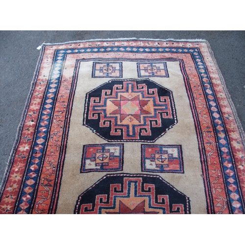 883 - AN ARAAK RED GROUND RUG