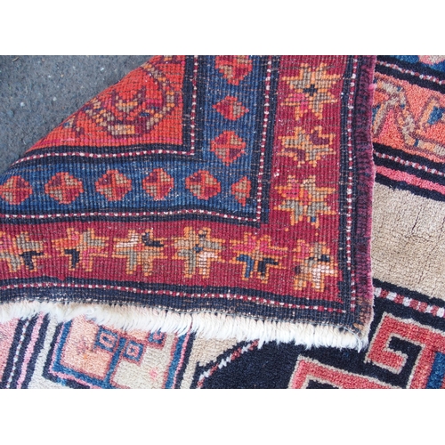 883 - AN ARAAK RED GROUND RUG