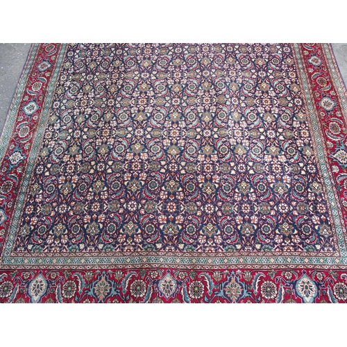 885 - A HAMADAN BLUE GROUND RUG