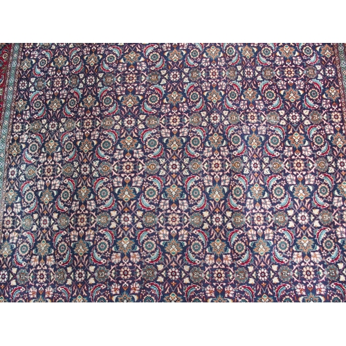 885 - A HAMADAN BLUE GROUND RUG