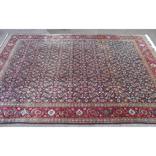 885 - A HAMADAN BLUE GROUND RUG