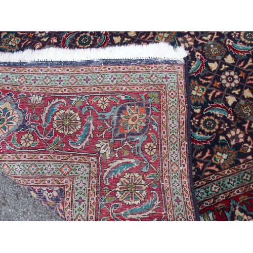 885 - A HAMADAN BLUE GROUND RUG