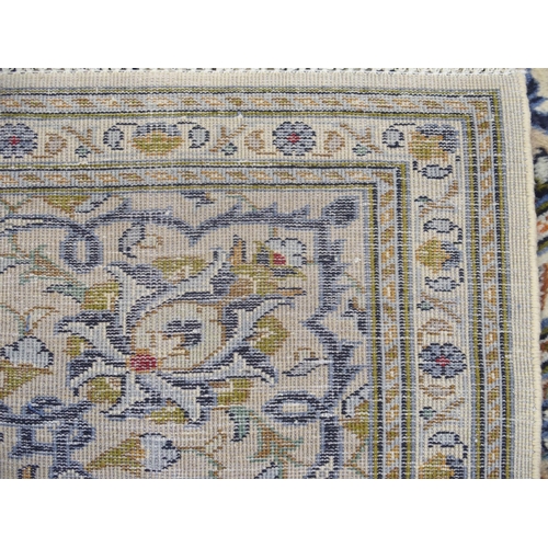 888 - A CREAM GROUND KASHAN RUG