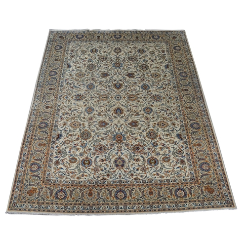 889 - A CREAM GROUND FINE KASHAN RUG