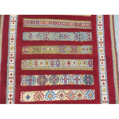 890 - A RED GROUND SOZANI RUG