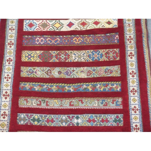 890 - A RED GROUND SOZANI RUG