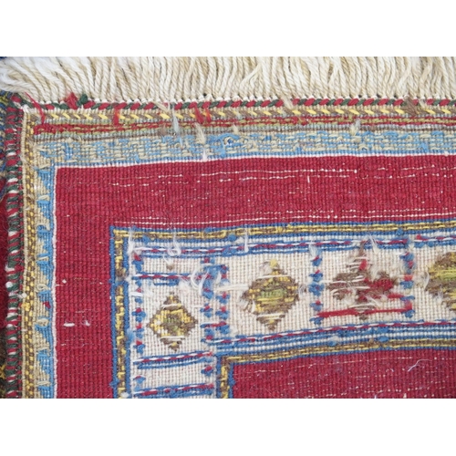 890 - A RED GROUND SOZANI RUG