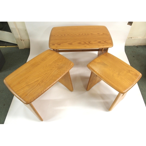 918 - A LIGHT ERCOL WINDSOR NEST OF THREE TABLES