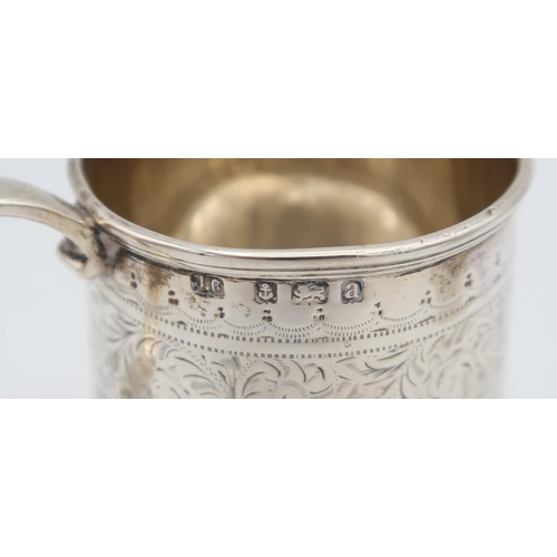 384 - An Edwardian silver christening mug, with engraved bands of scrolling foliate and ribbon decoration,... 