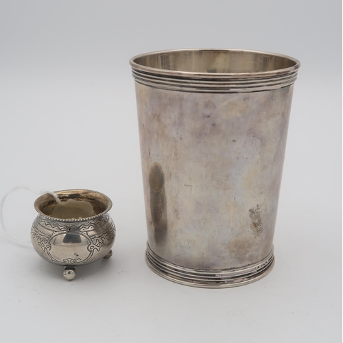 394 - A 20th century American sterling silver beaker, of typical form, by Manchester Silver Co., and a Rus... 