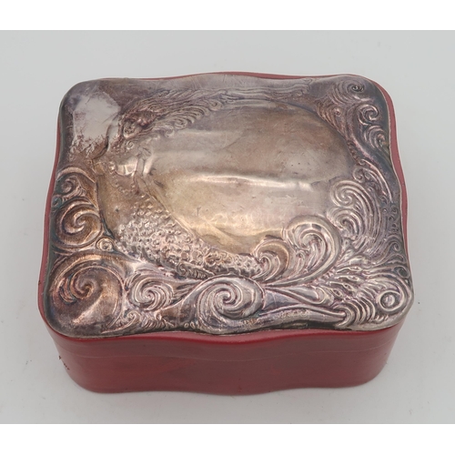 411 - A silver topped leather jewellery box, the lid decorated with a mermaid surrounding a naturalistic c... 