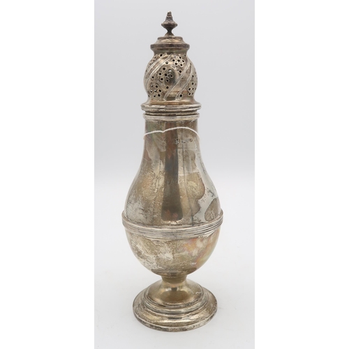 413 - A large silver caster, of baluster form, the lid with pierced geometric decoration, with a turned fi... 