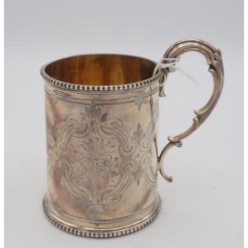 417 - A Victorian silver christening mug, with a double scroll handle and beaded rims, the body with engra... 