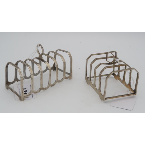 421 - A silver four division toast rack by Elkington & Co, Birmingham 1947, another six division examp... 