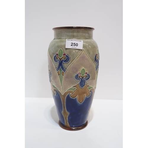 250 - A Royal Doulton tubelined vase in shades of blue, brown and green