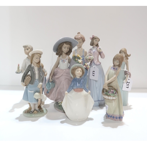 257 - Seven Lladro figures on children and a Nao example