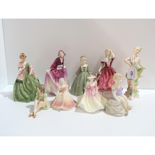 259 - A Wedgwood figure Spring, together with eight other figures by Paragon, Royal Worcester, Coalport