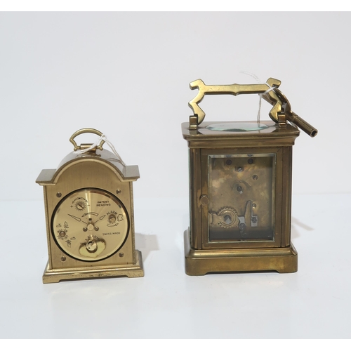 269 - A French brass and glass carriage clock and another clock by Swiza