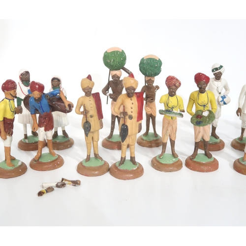 278 - A set of Indian painted chalk figures