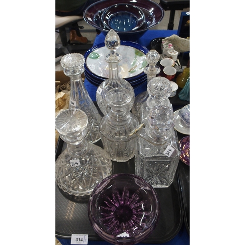 314 - Assorted cut glass and crystal decanters, together with studio pottery dishes in purple and blue gla... 