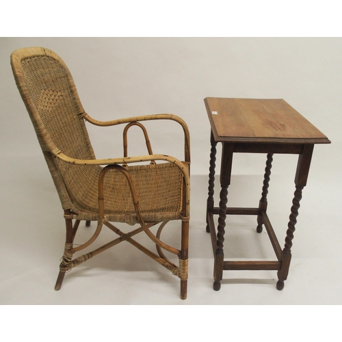 104 - A 20th century Dryad wicker armchair and an oak barley twist occasional table (2)