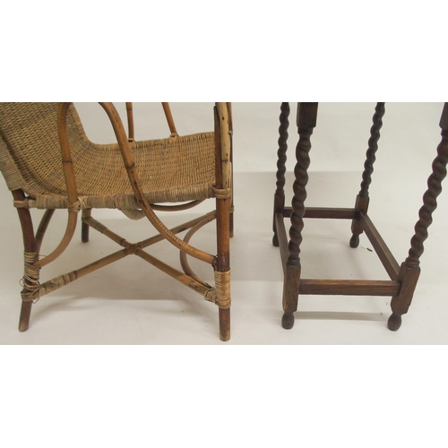 104 - A 20th century Dryad wicker armchair and an oak barley twist occasional table (2)