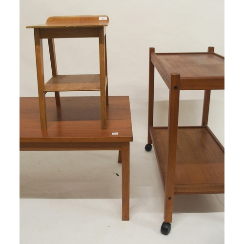 105 - A mid 20th century teak coffee table, teak two tier tea trolley and a laminated top stool (3)