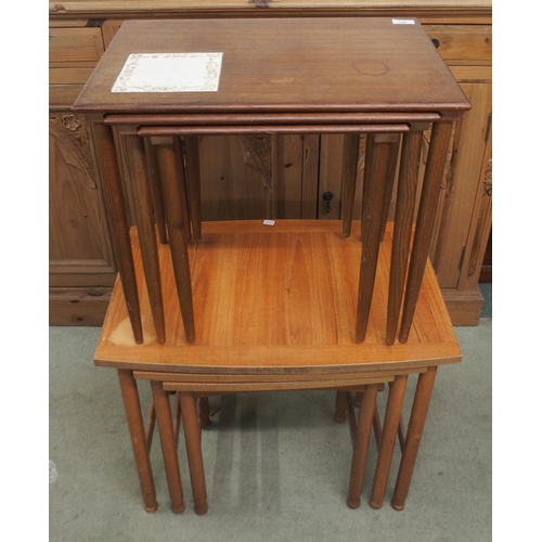 106 - A mid 20th century teak Schreiber nests of three tables and another mid 20th century teak nest of th... 