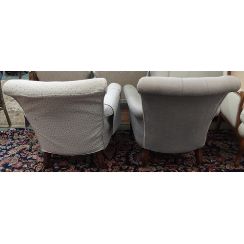 113 - A pair of Victorian armchairs both with square tapering supports terminating in ceramic casters, one... 