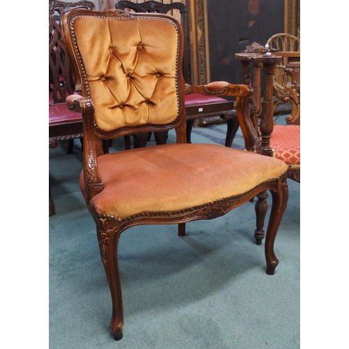 119 - A Victorian oak corner chair carved with carved cherub surmount, dual splats carved with pairs of bi... 