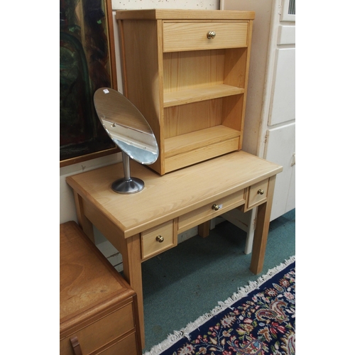 84 - A 20th century pine three drawer dressing table, pine single drawer bedside table and a oval dressin... 