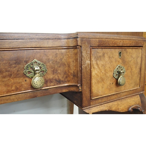 89 - An early 20th century walnut ladies writing desk with red leather skiver over three drawers on cabri... 