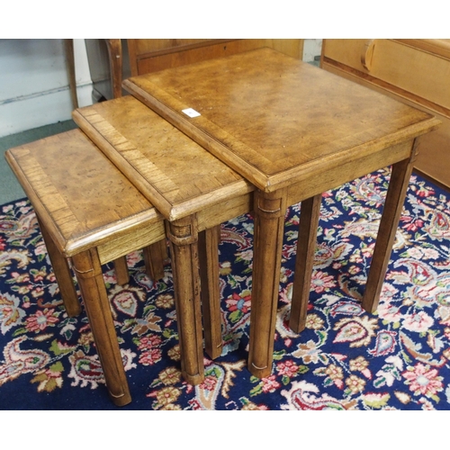 90 - An Edwardian mahogany and satinwood inlaid two tier occasional table and a 20th century walnut nest ... 