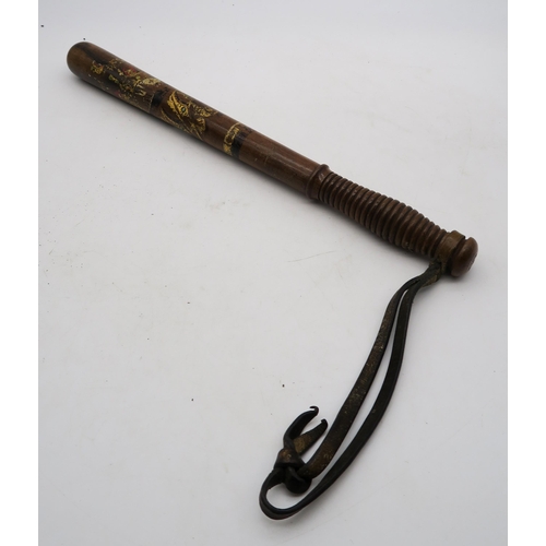 A polychrome decorated police truncheon