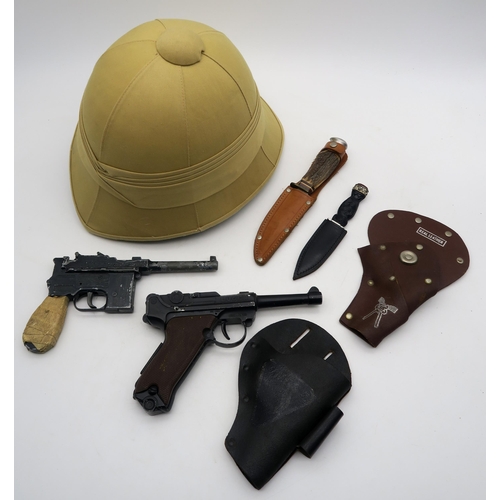 530 - An antler-handled West German hunting knife, a miniature sgian dubh, costume pith helmet and two toy... 