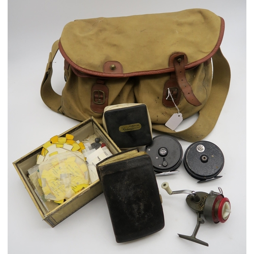 546 - A Brady fishing bag containing an assortment of fishing tackle, including a Youngs Beaudex reel, a F... 